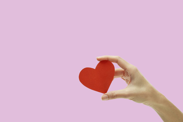 Red heart valentine day on pink background - Fotó, kép