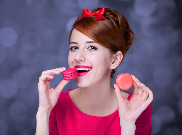 Redhead girl with macaron for St. Valentine Day. - Photo, Image