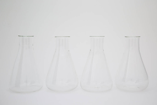 Group of scientific laboratory glass erlenmeyer flask isolated on white background - Photo, image