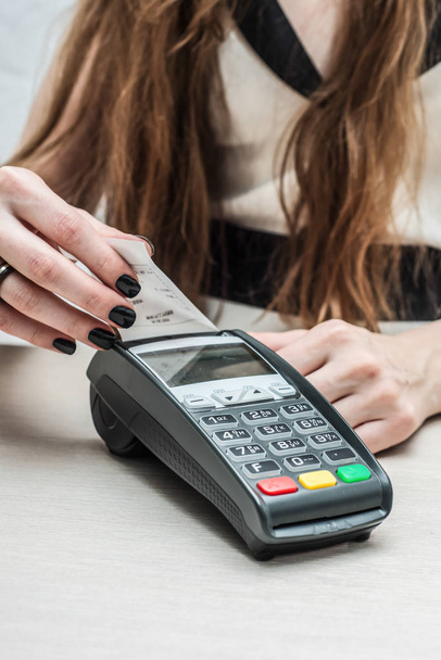Credit or debit card password payment. Customer hand is entering - Фото, изображение