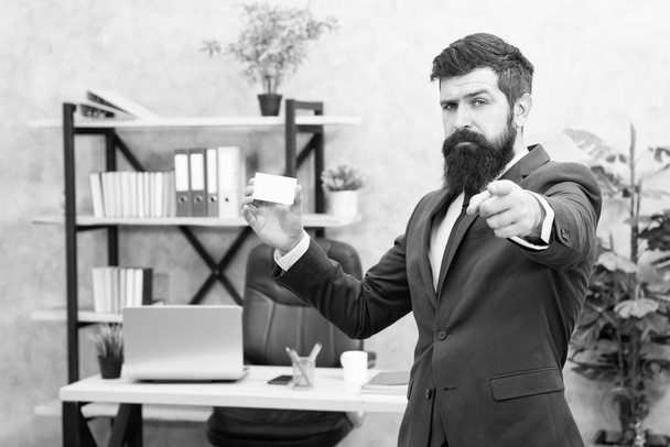 Financial support. Bearded hipster top manager hold card. Banking services. Guy formal suit stand in office. Businessman hold blank card. Finance and accounting. Easy and quick payment. Bank card - Fotografie, Obrázek