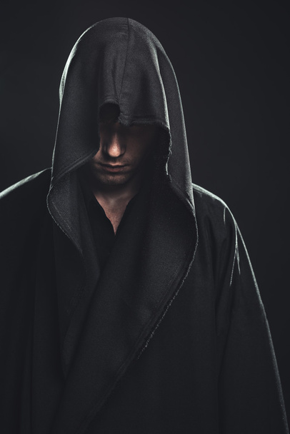 Portrait of man in a black robe - Foto, imagen