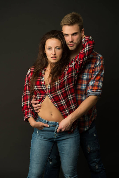 Sexual desire. Sex shop. Intimacy. Sensual couple. Happy valentines day. Love and romance. Man and girl romantic date. Couple in love. Sexy couple checkered shirts copy space. True feelings - Photo, Image
