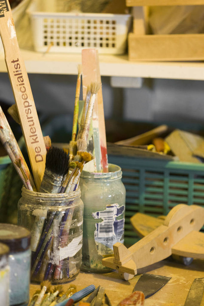 Artists Tools Perched on Workbench - Photo, Image