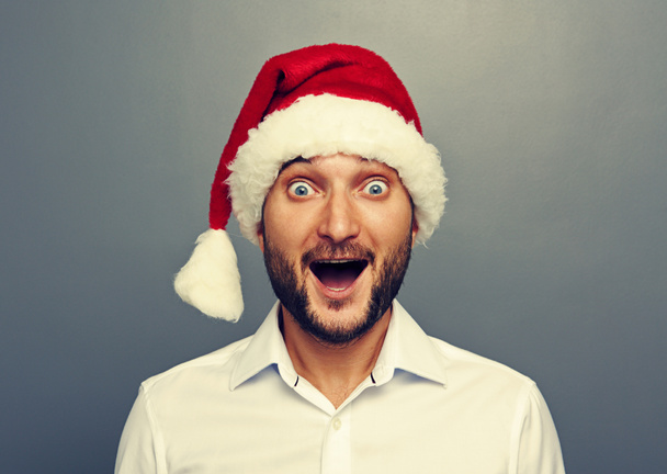 funny christmas man over grey - Фото, изображение