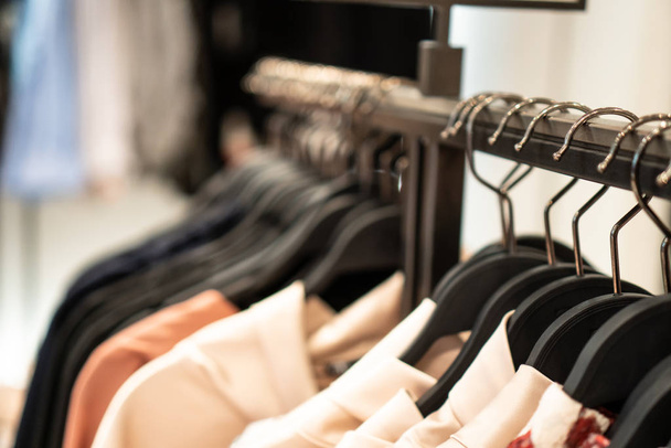 Close up clothes hangers on rack. Background for fashion retail  - Fotografie, Obrázek