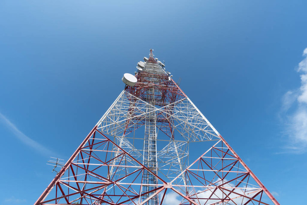 Communication tower and blue sky view - Photo, Image