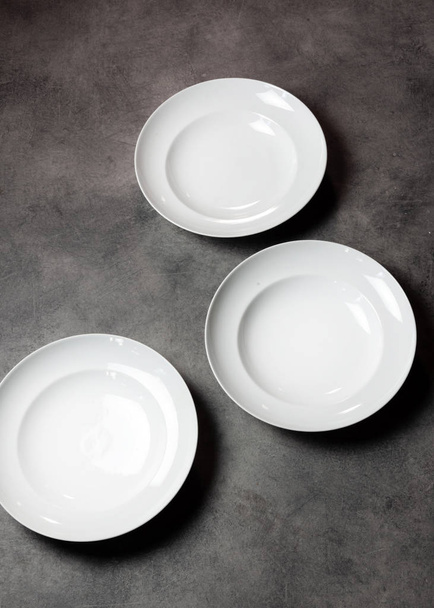 Set of different empty plates Overhead View  - Zdjęcie, obraz