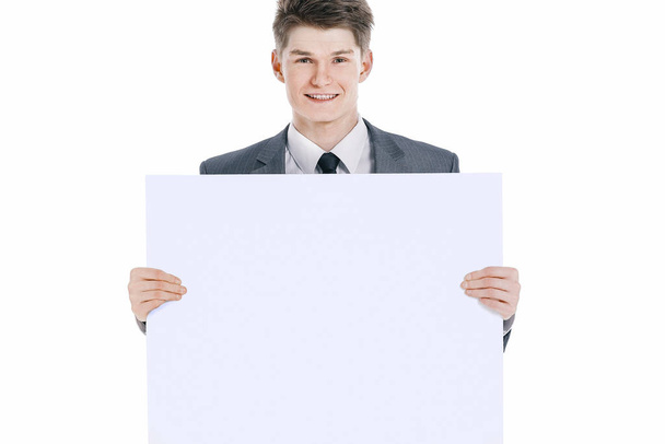 successful young businessman with blank banner.isolated on a white - Valokuva, kuva