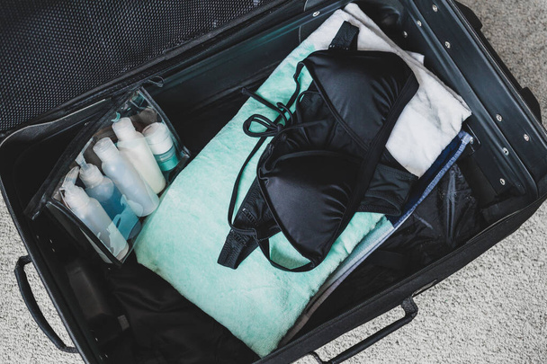 packing light for a holiday concept, luggage with just a  beach  - Valokuva, kuva