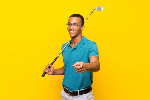 African American golfer player man points finger at you with a confident expression - Фото, изображение