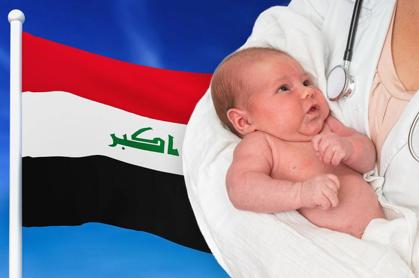 Birth rate in Iraq. Newborn baby in hands of doctor. - Photo, Image