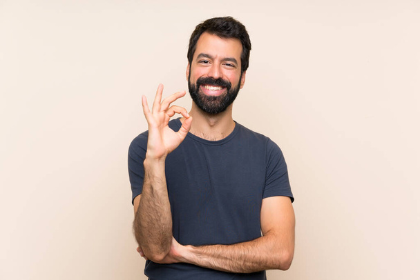 Man with beard showing ok sign with fingers - Photo, Image