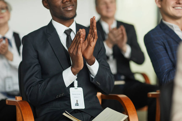 Businessman applauding at seminar - Photo, Image