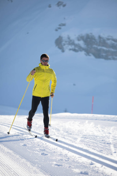 Young man cross-country skiing on a winter - Photo, image