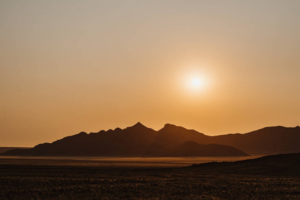 sunset at NamibRand Naturreservat in Namibia, Africa - Фото, зображення
