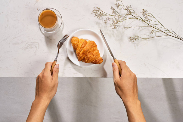 Cup of coffee and croissants. Top view. - Photo, Image