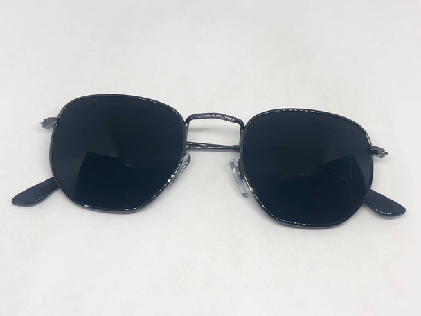 Assortment of sunglasses, white background - 写真・画像