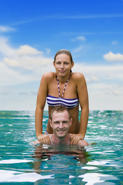 Playful couple in the water - Photo, Image