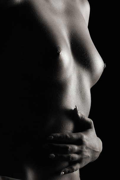beautiful low key shot shows a woman's body - Photo, image