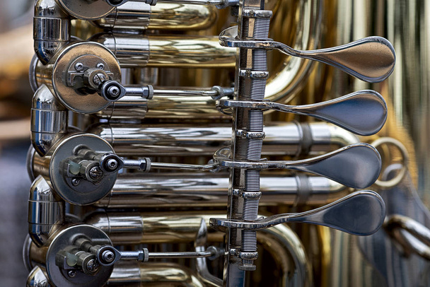 close up of the valves of a tuba - Photo, Image