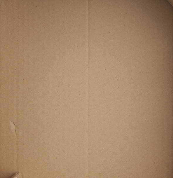 piece of smooth brown cardboard paper, full frame - Photo, Image