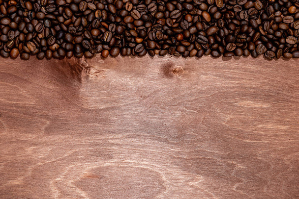 Kávébab csík sötét fa textúra háttér, Másolat szöveg - Fotó, kép