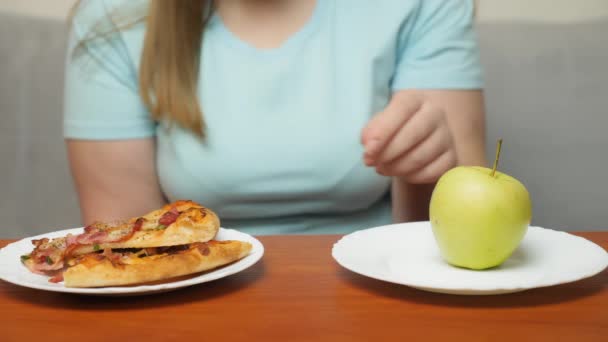 Choice between healthy and unhealthy food - Footage, Video