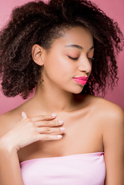 portrait of tender african american girl with perfect skin and closed eyes, isolated on pink - Foto, immagini