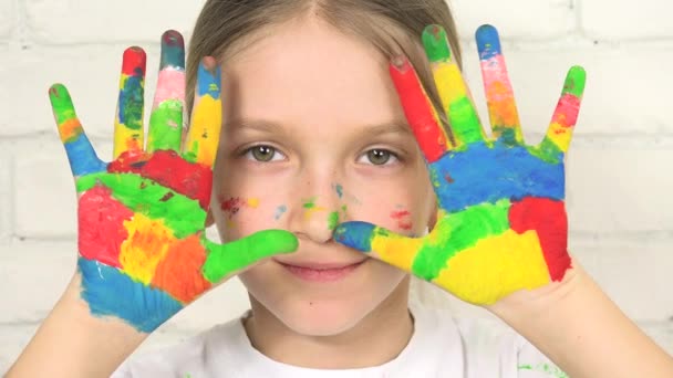 Child Playing Painted Hands, Kid Looking in Camera, Smiling School Girl Face - Кадри, відео