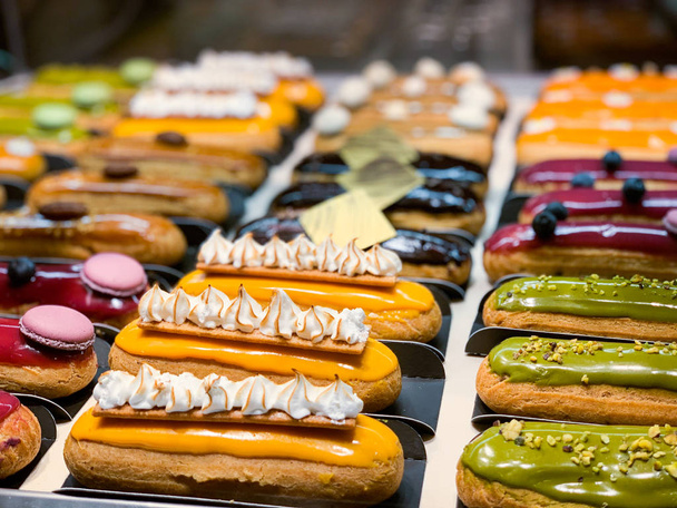tasty french eclairs with fresh fruits - Photo, Image