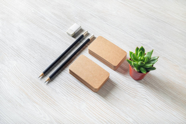Business cards, pencils, eraser, plant - Photo, Image