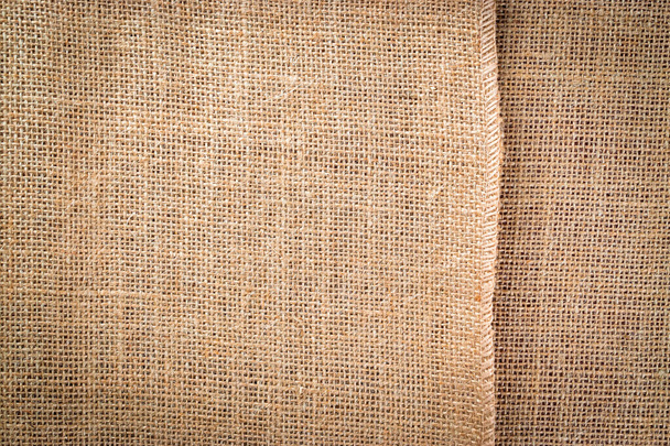 Linen background. Natural organic beige canvas. Brown woven Backdrop. Linen weave Material cotton background - Photo, Image