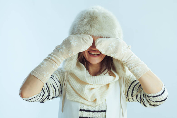 happy middle age woman playing with winter socks - Φωτογραφία, εικόνα