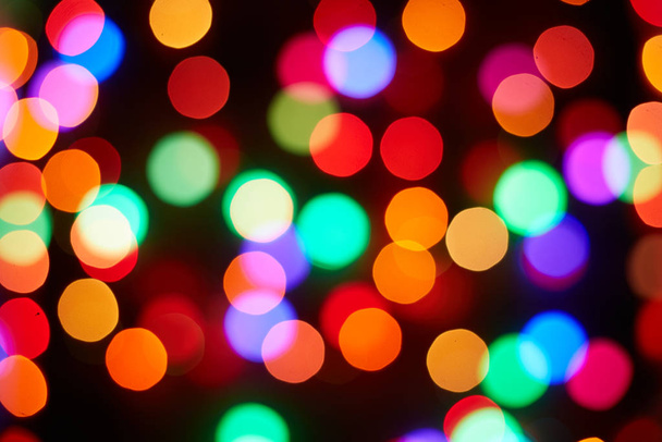 Red and orange, green, blue holiday bokeh. Abstract background - Foto, Imagen