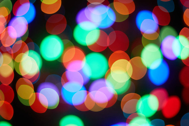 Red and orange, green, blue holiday bokeh. Abstract background - Фото, зображення