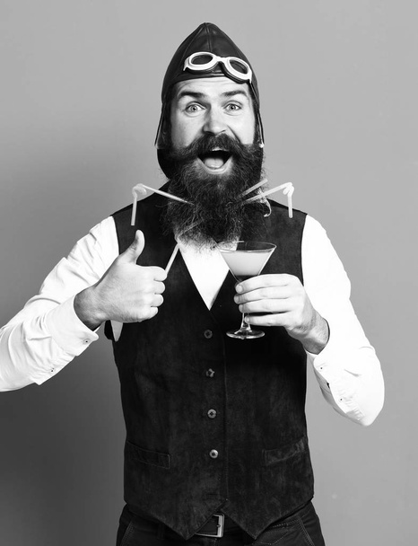 happy handsome bearded pilot or aviator man with long beard - Foto, afbeelding