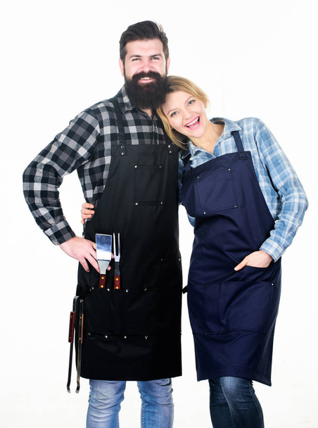 Backyard barbecue party. American food tradition. Cooking together. Couple in love getting ready for barbecue. Man bearded guy and girl ready for barbecue white background. Picnic and barbecue - Zdjęcie, obraz
