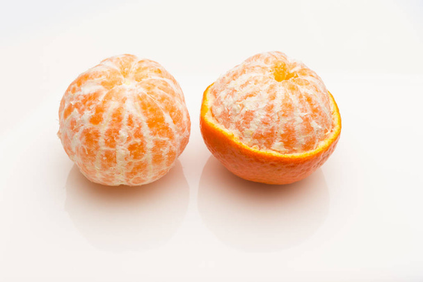 Tangerine orange-skinned sweet fruit of the citrus family. - Fotó, kép