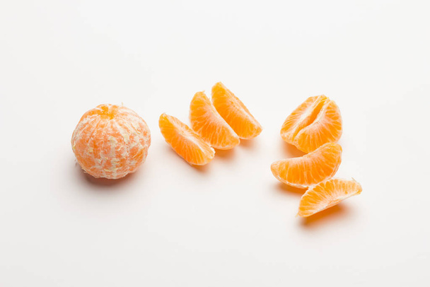 Mandarinky s pomerančovou slupkou sladké plody z rodiny citrusů. - Fotografie, Obrázek
