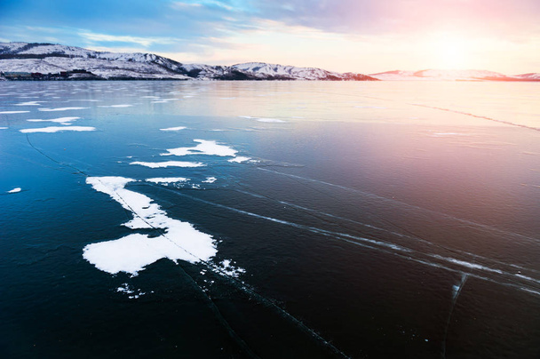 Ice on the frozen lake. Beautiful winter landscape.  - Photo, Image