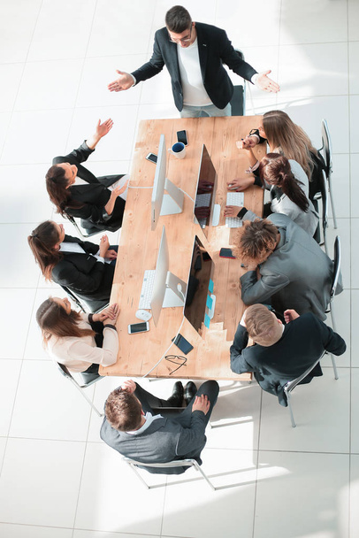 top view. business team applauding at a work meeting - Фото, зображення