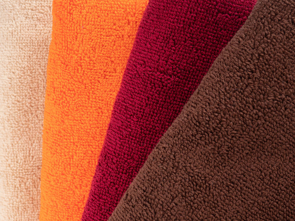 closeup multicolored stack of towels - 写真・画像