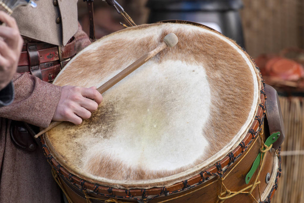 large medieval drum player - 写真・画像