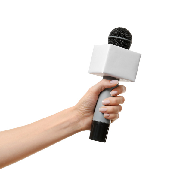 Újságíró keze mikrofonnal fehér alapon - Fotó, kép