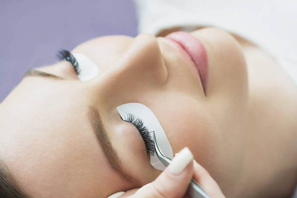 Eyelash Extension Procedure.   - Photo, image