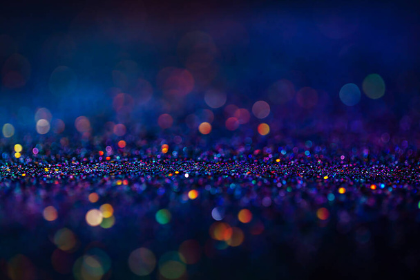 Shiny multicolor glitter raster background. Abstract shimmering pink, blue, yellow circles decorative backdrop. Bokeh lights effect illustration. Overlapping glowing and twinkling spots. - Foto, Imagen