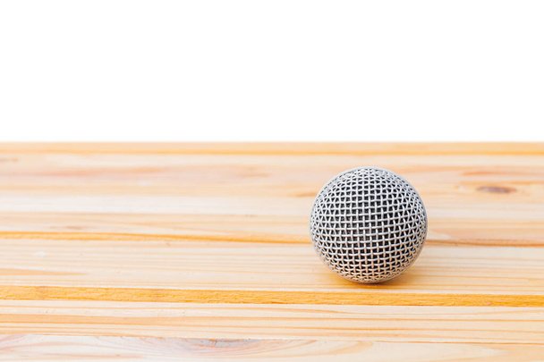 microphone dynamic on wooden table yellow with white background - Photo, Image