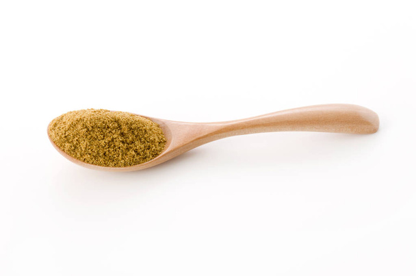 Cumin Powder in wooden spoon on White Background - Photo, Image