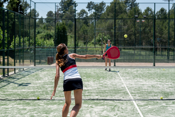 Woman playing padel outdoor - Photo, image